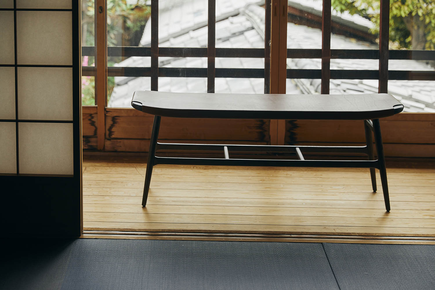 Freja bench in walnut / black leather from Stellar Works